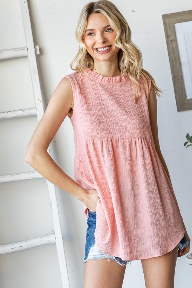 blush ruffle mock neck sleeveless blouse
