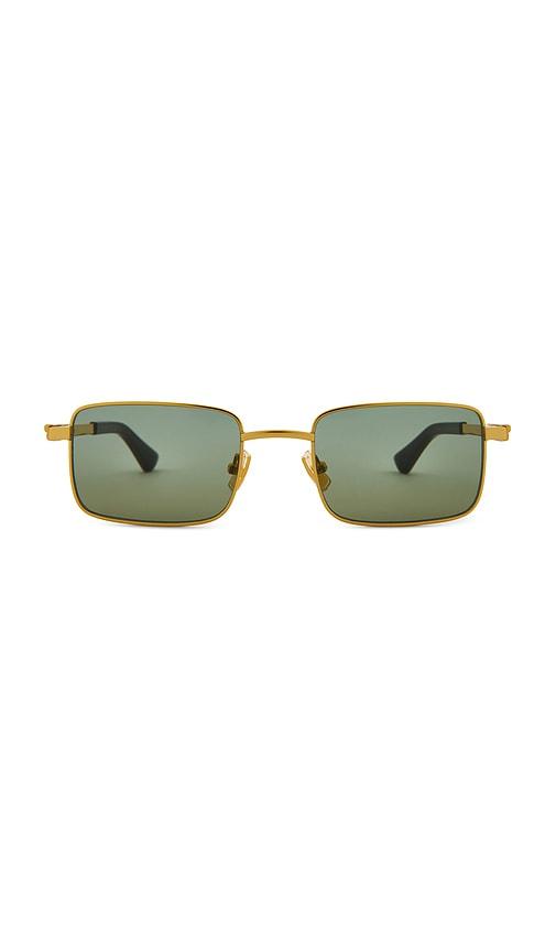 bottega veneta rectangular sunglasses in metallic gold.