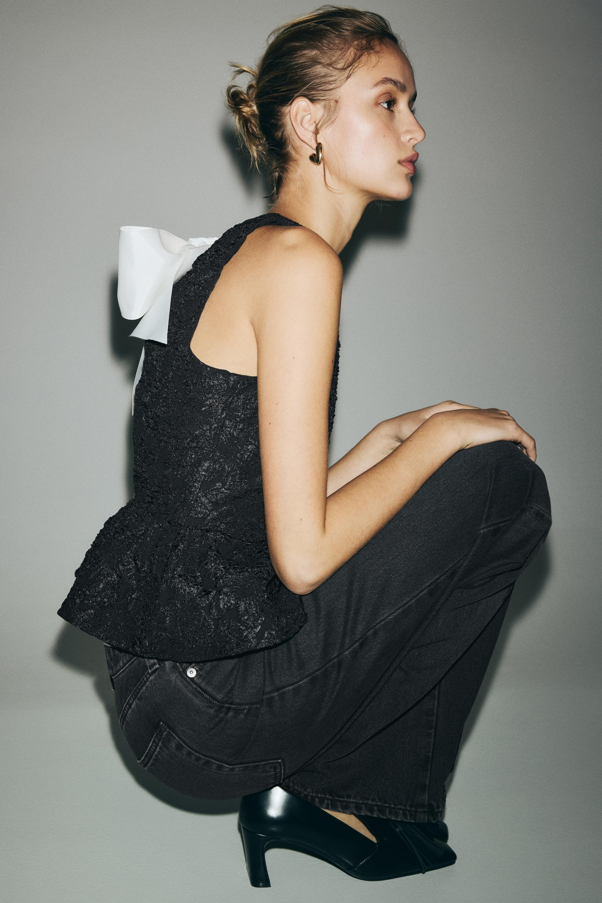 bow-detail peplum top