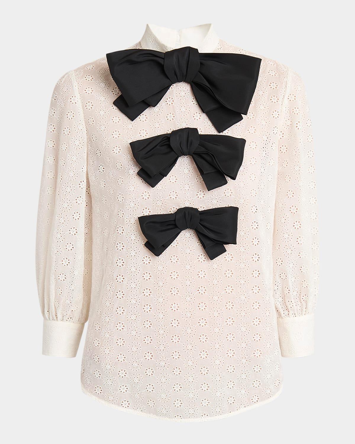 bow eyelet mock-neck top
