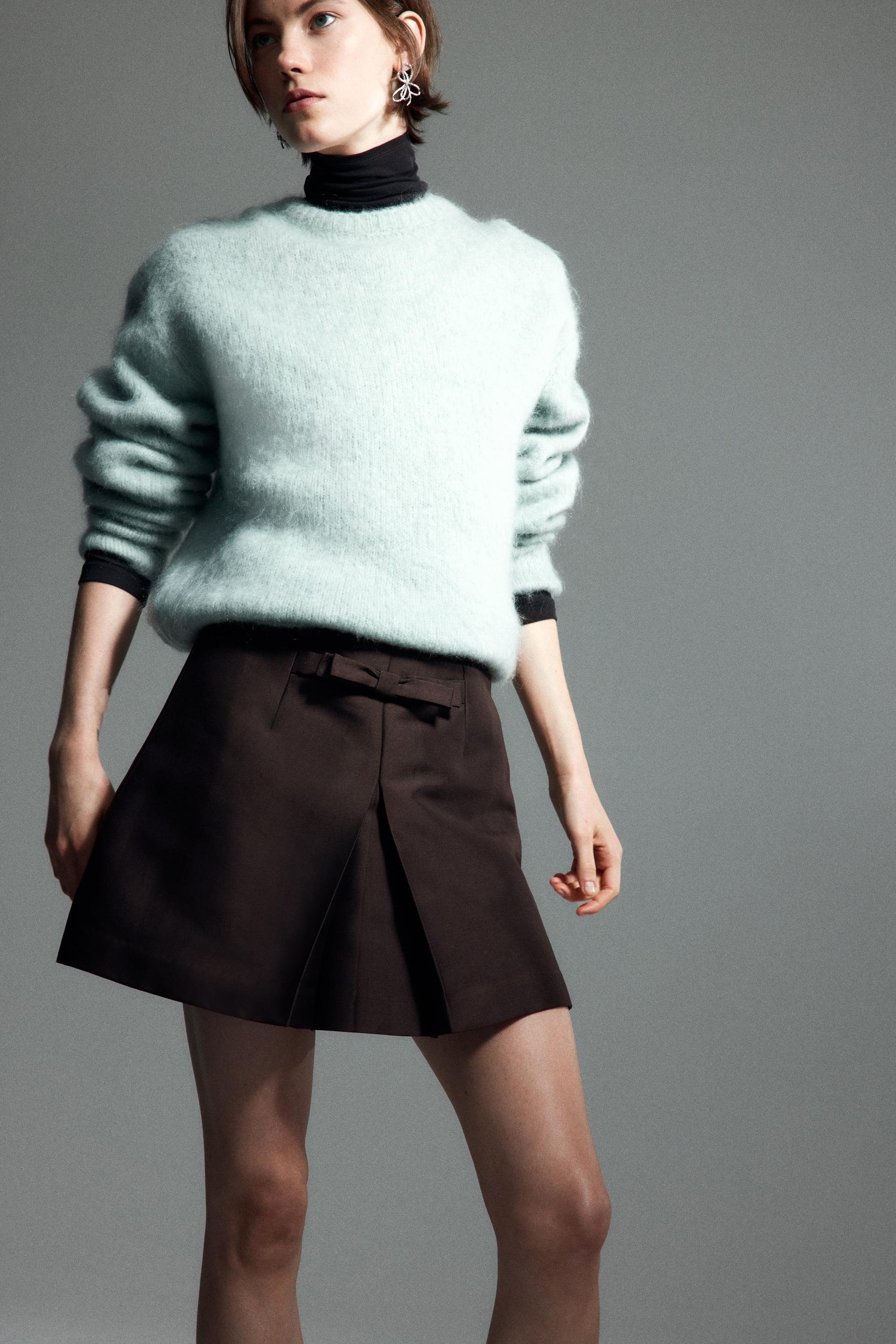 bow-front mini skirt