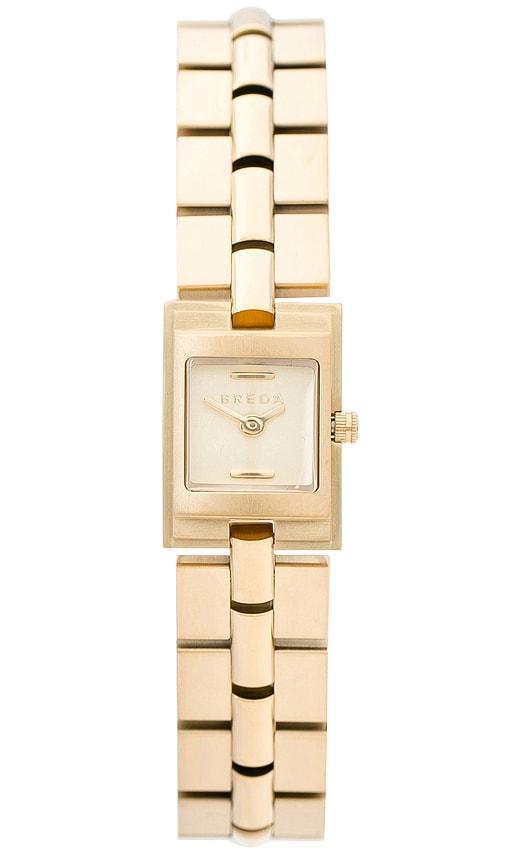 breda relic watch in metallic gold.