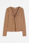 buckle-detail top