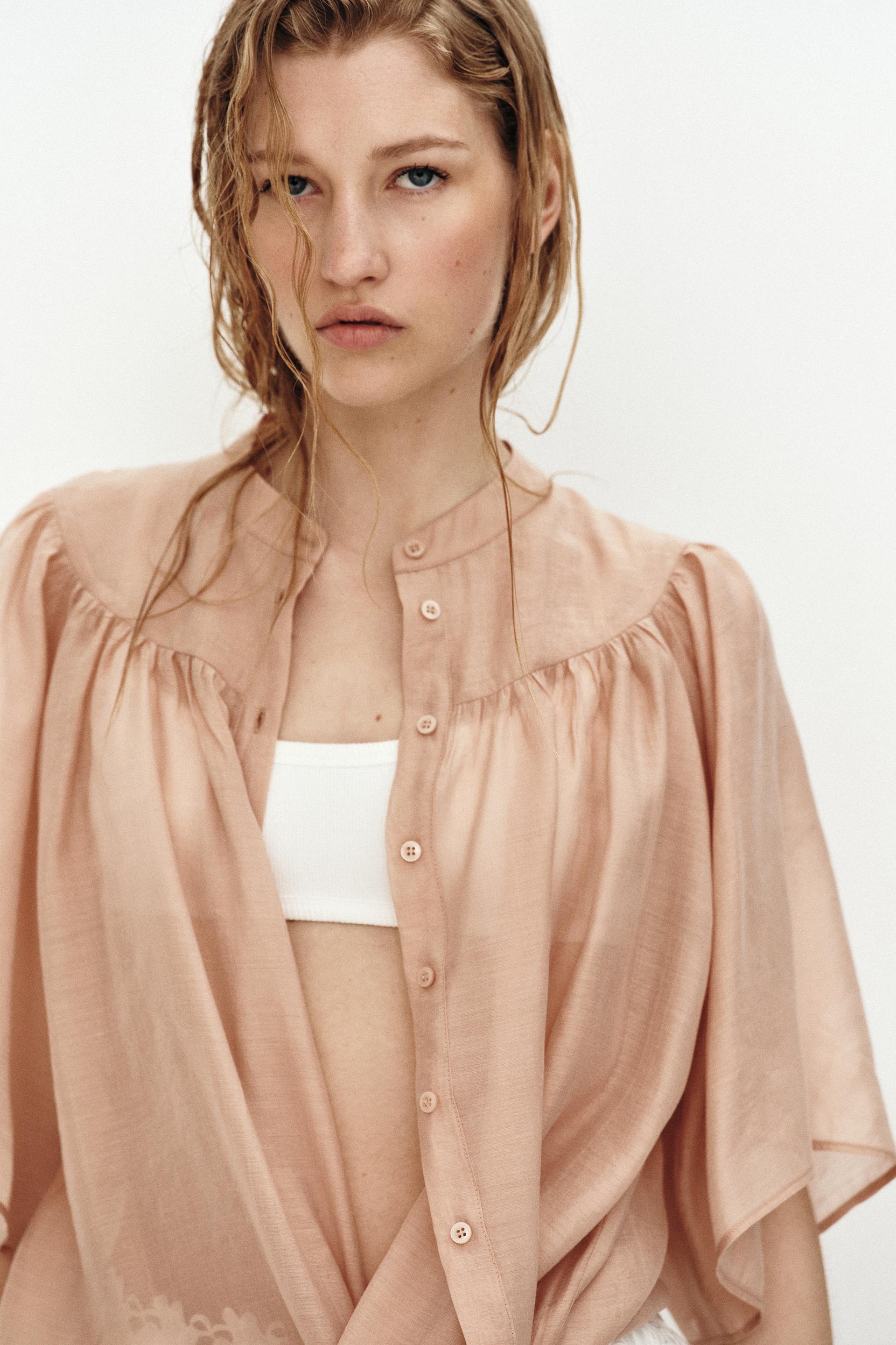 butterfly-sleeved blouse