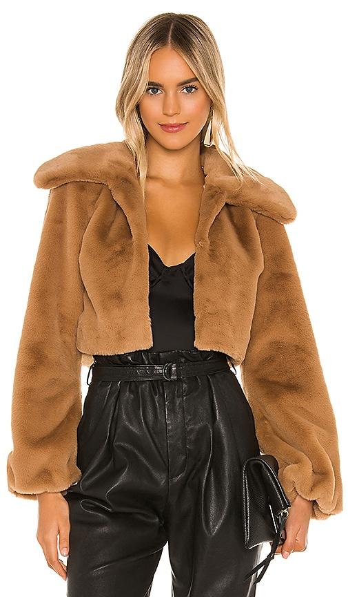 camila coelho cleobella cropped faux fur jacket in beige.
