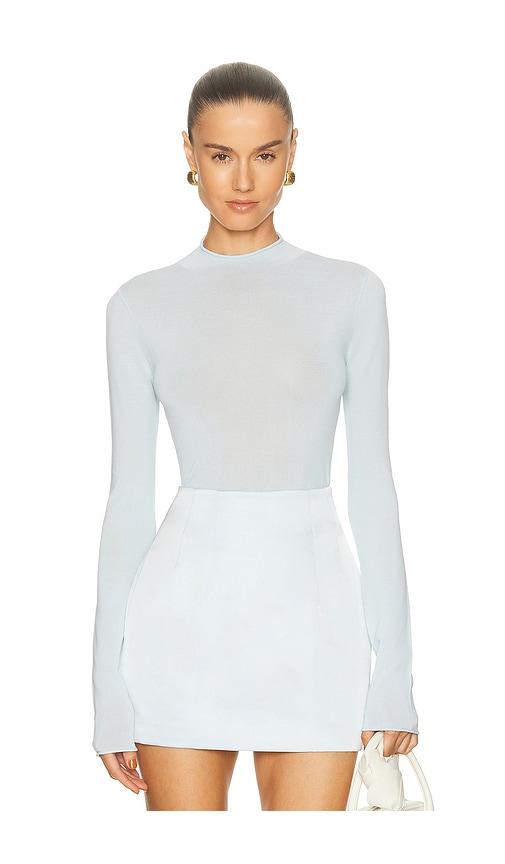 camila coelho pauline mock neck sweater in baby blue.