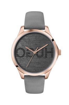 carnation-gold-effect watch with reverse-logo dial