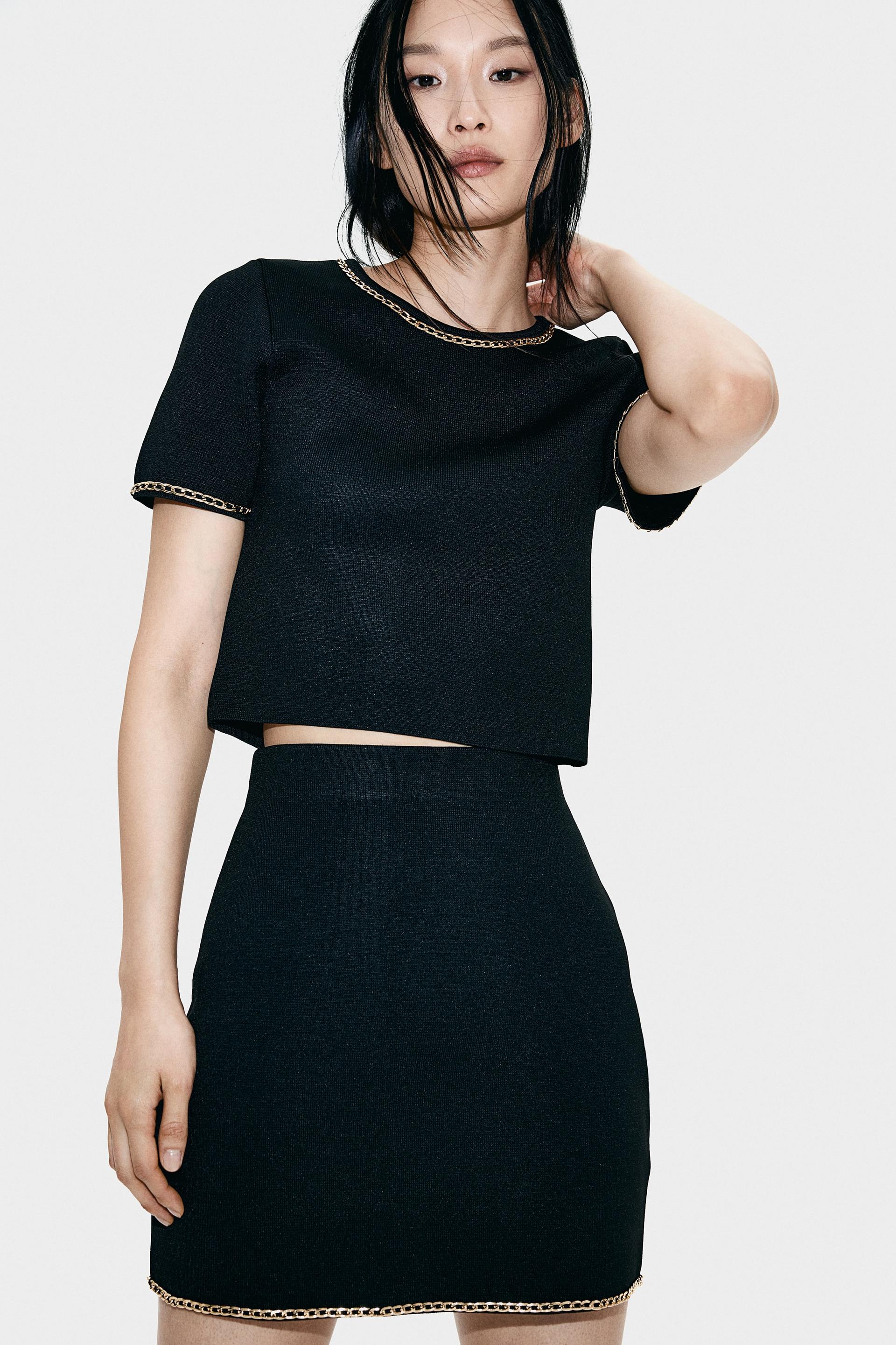 chain-detail knit top
