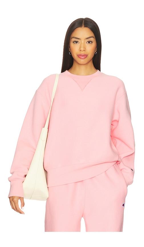 champion essentials reverse weave crew neck sweatshirt in pink.