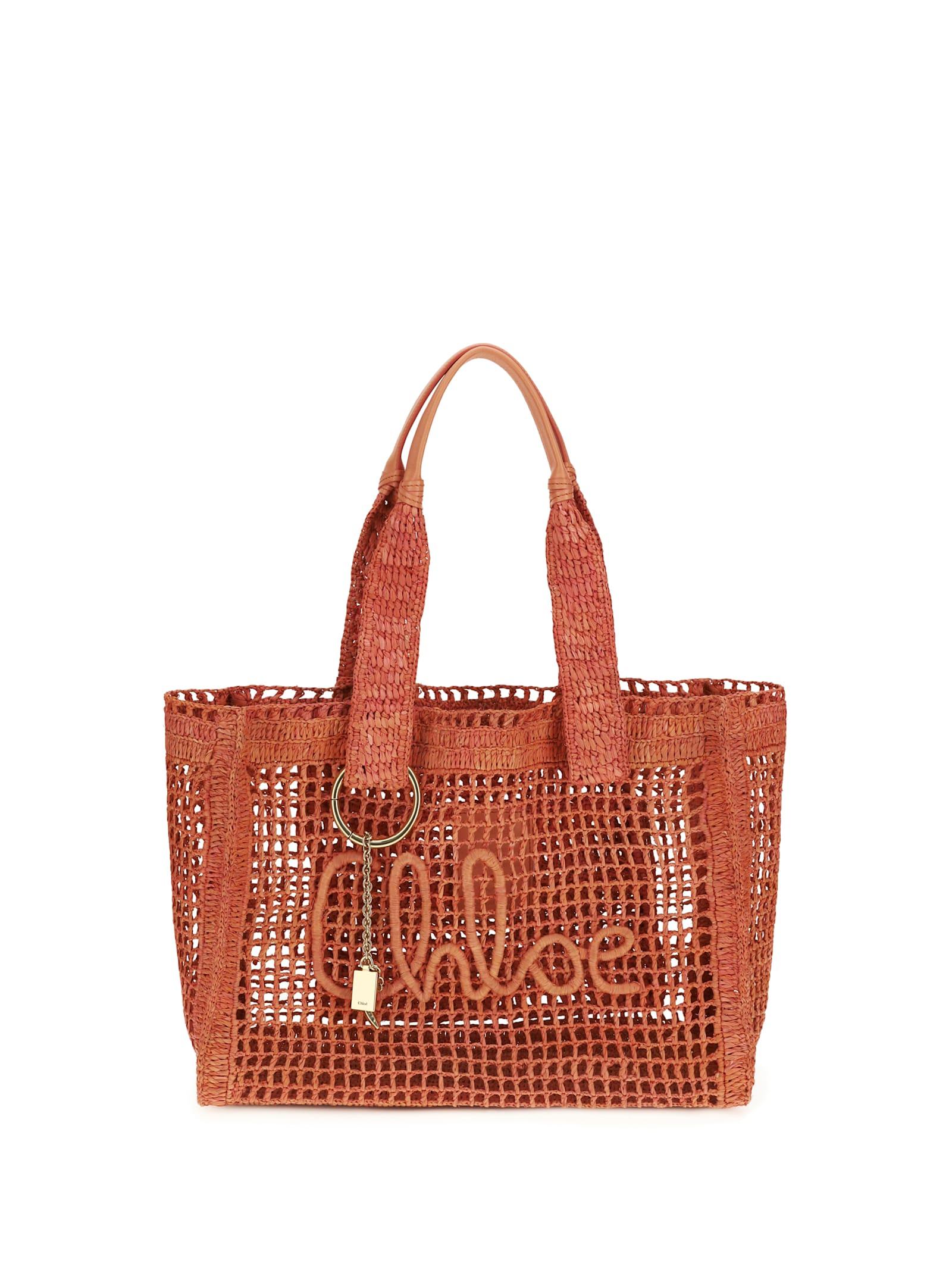 chloé east-west summer banana raffia tote bag