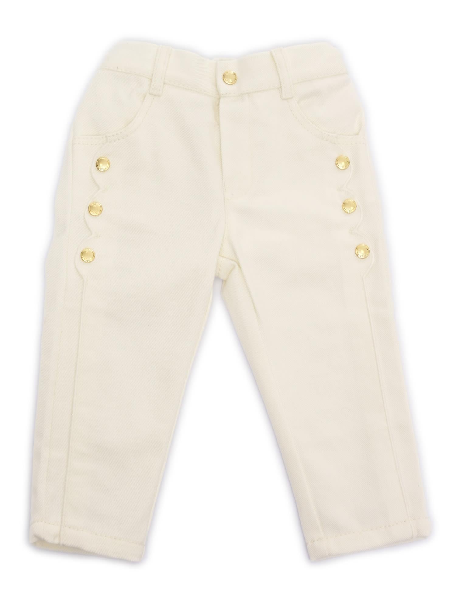 chloé five-pocket organic drill pants with scallops on front. waist and zipper fly closure, chlo branded button. chlo paris cow leather label at back (leat