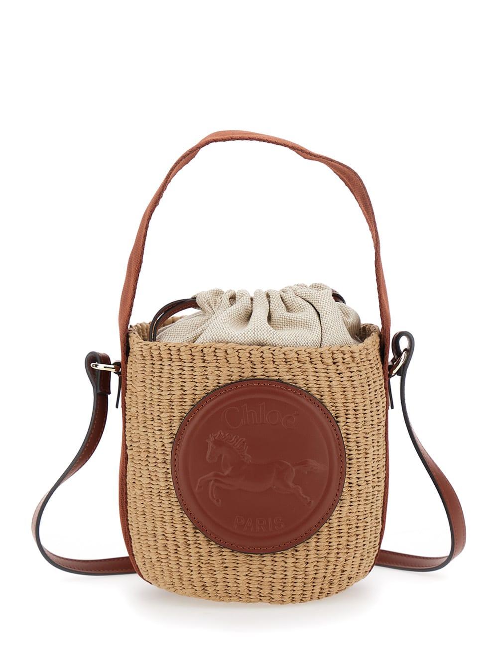 chloé horse medal small beige bucket bag with shoulder strap and logo patch on front in straw woman
