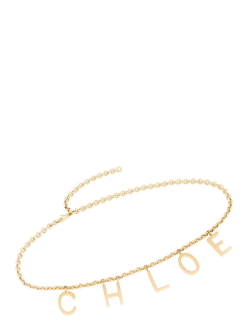 chloé metallic belt with adjustable hook closure and logo lettering charm in brass woman