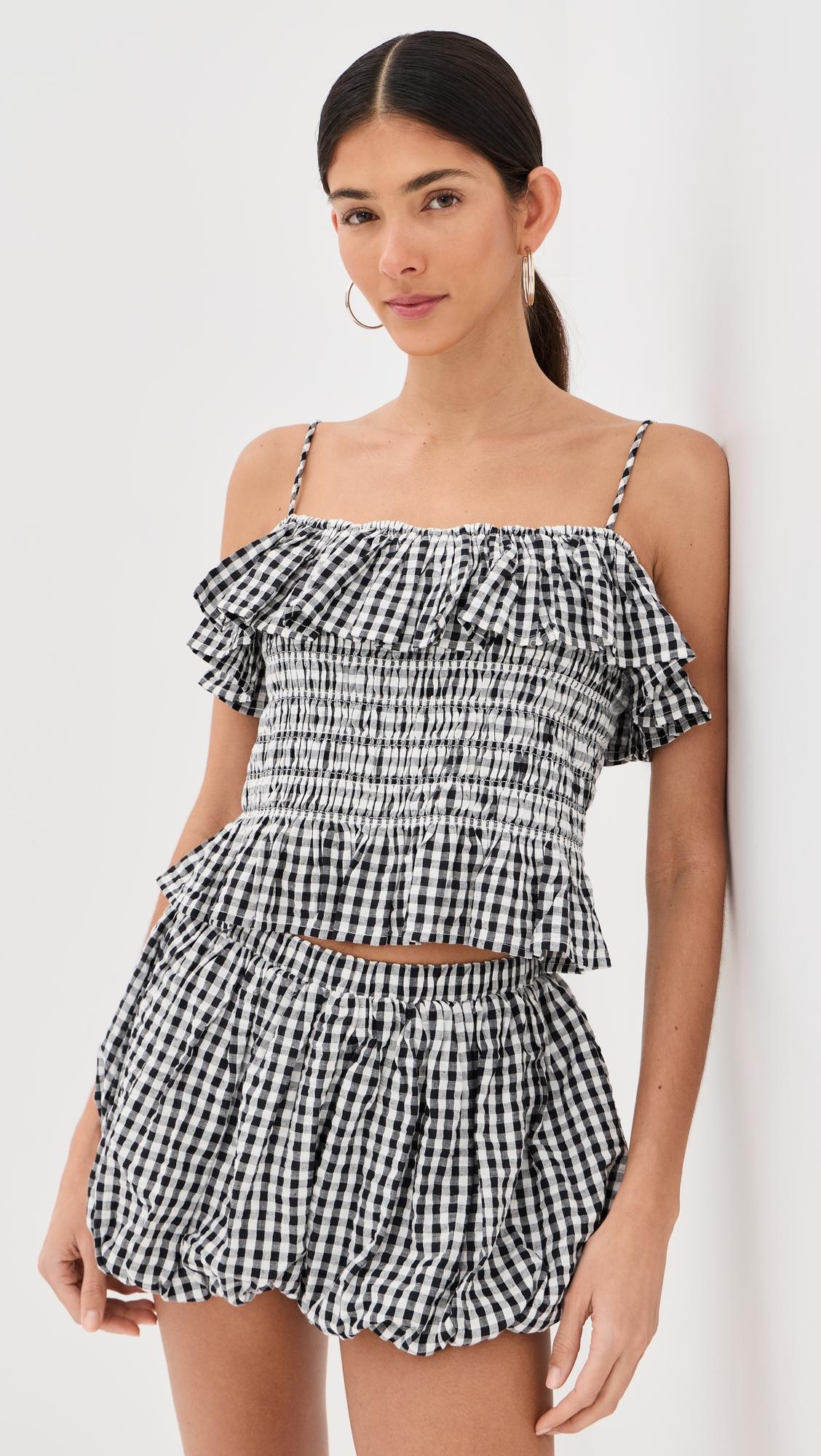 clara sideshow check top