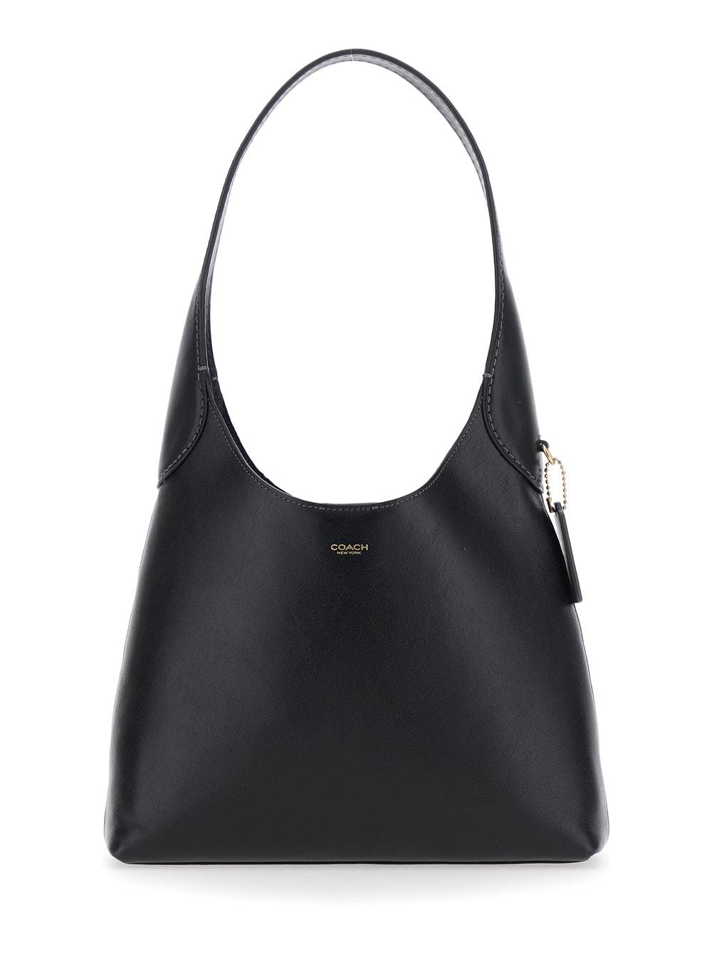 coach brooklyn small black shoulder bag with logo lettering on the front in leather woman