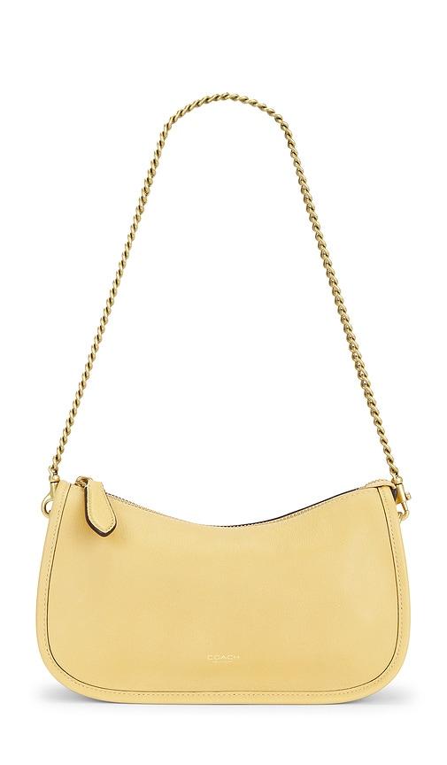 coach natural grain leather waverly shoulder bag in yellow.