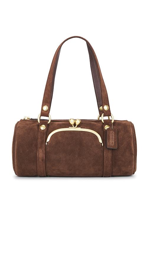 coach originals suede kisslock barrel bag in chocolate.