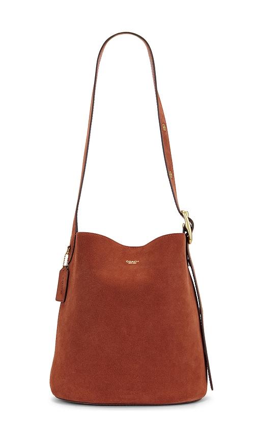 coach suede bleecker bucket bag in tan.