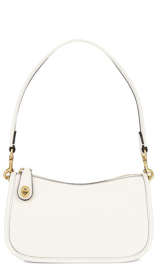 coach swinger 20 bag in white.