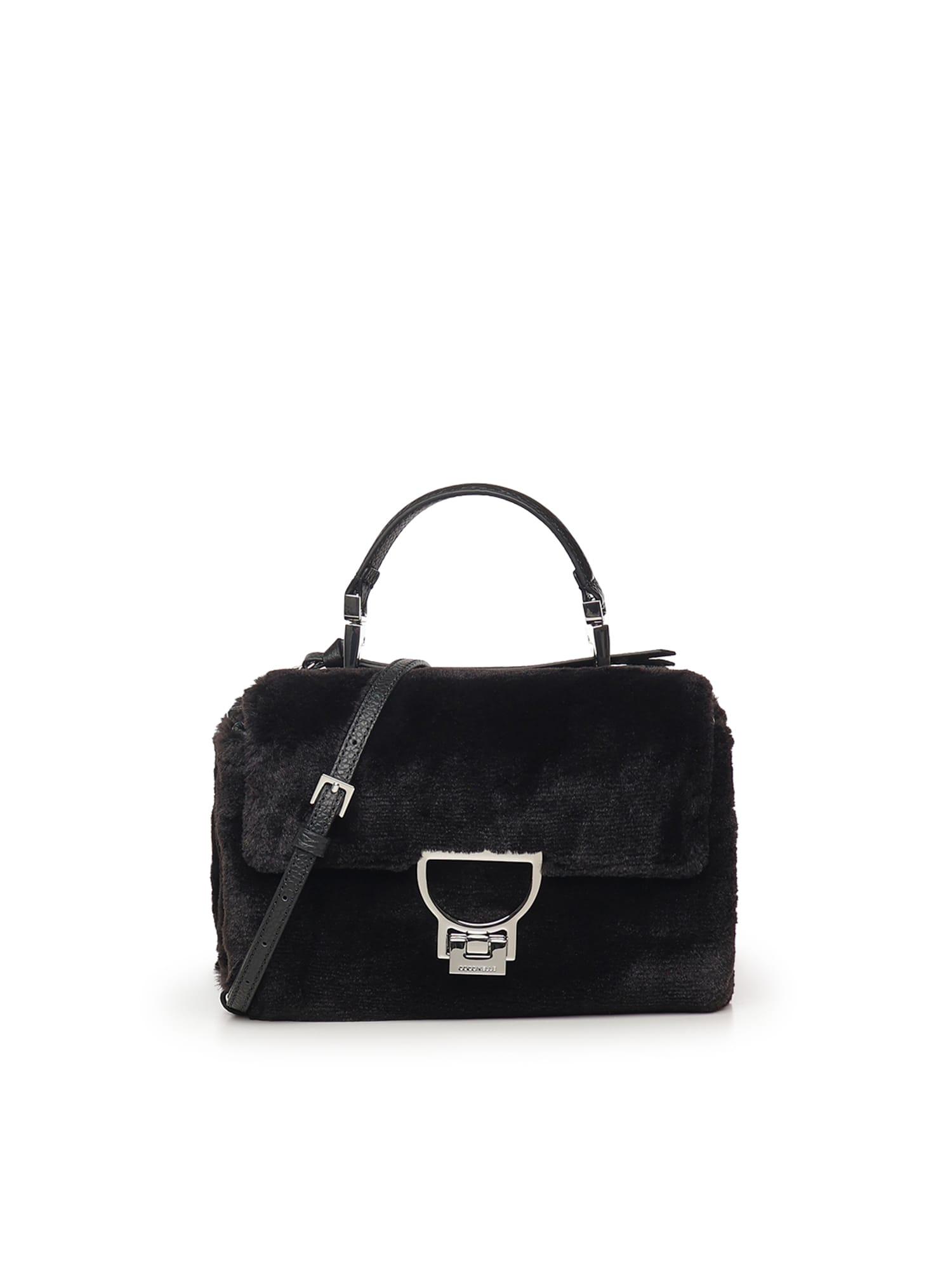 coccinelle arlettis faux fur and leather bag