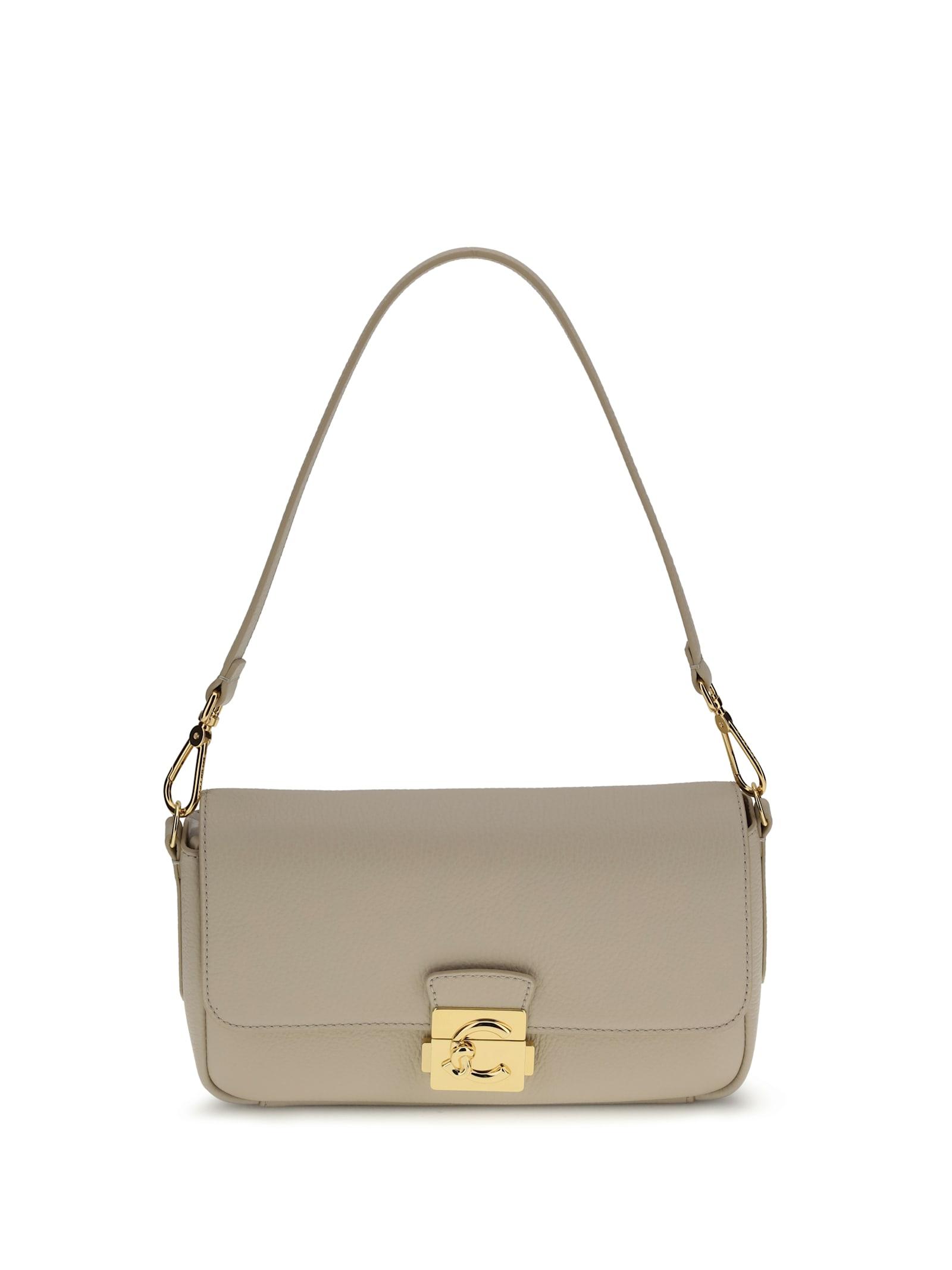 coccinelle c-me lock medium shoulder bag