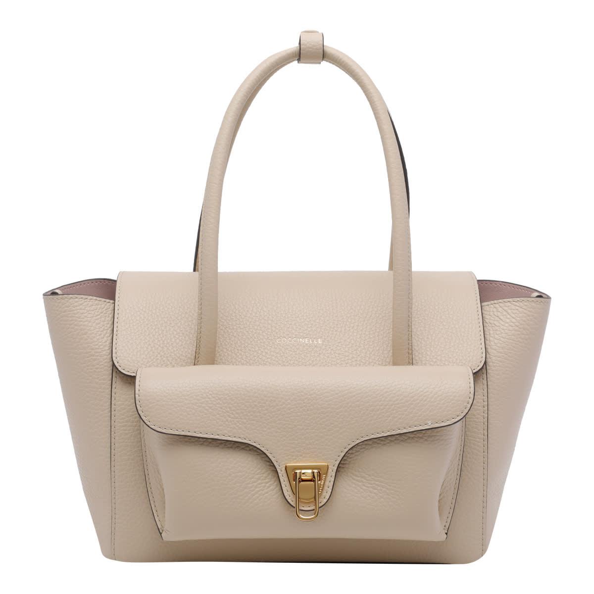 coccinelle double beat shoulder bag