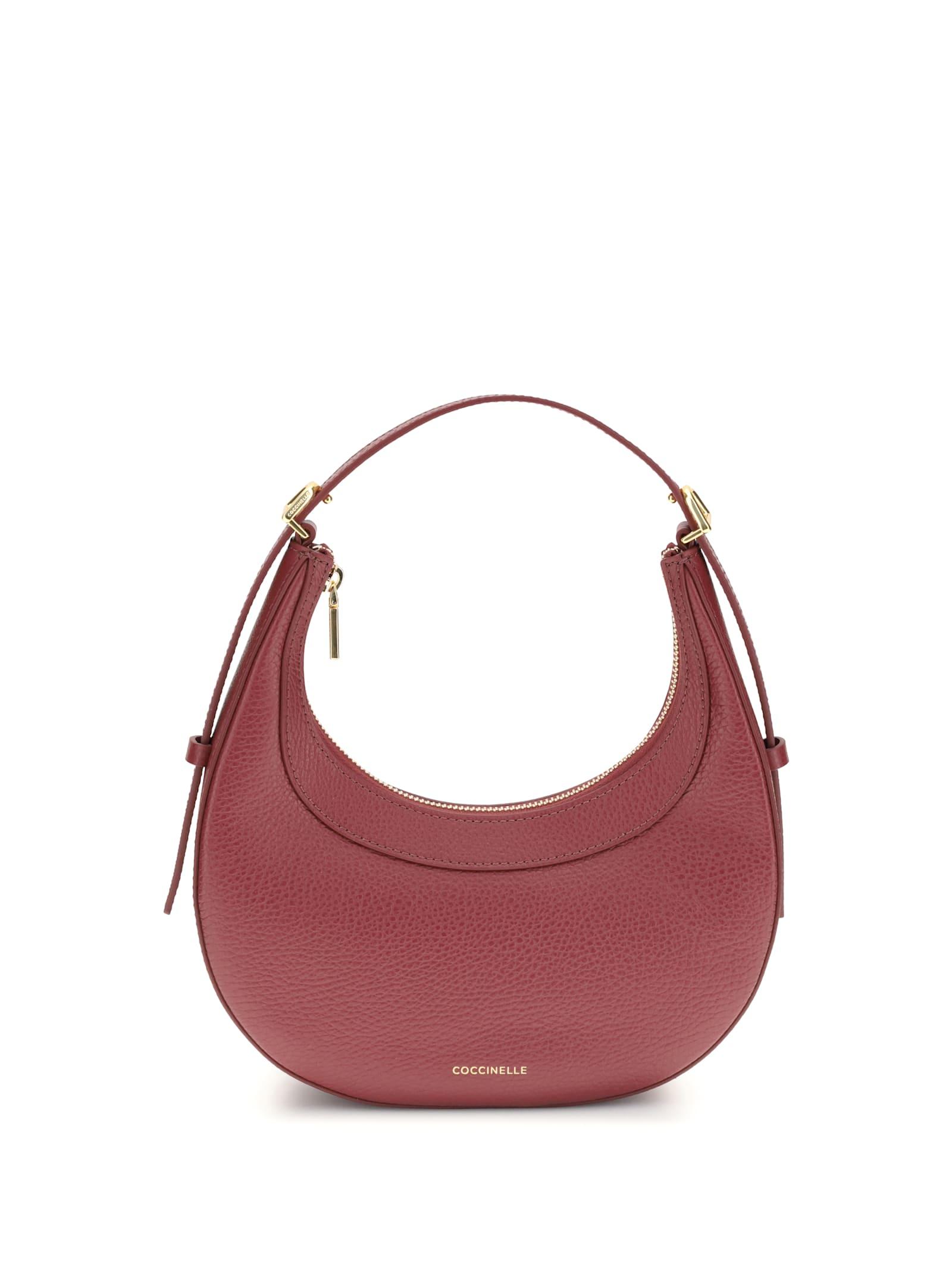 coccinelle whisper shoulder bag