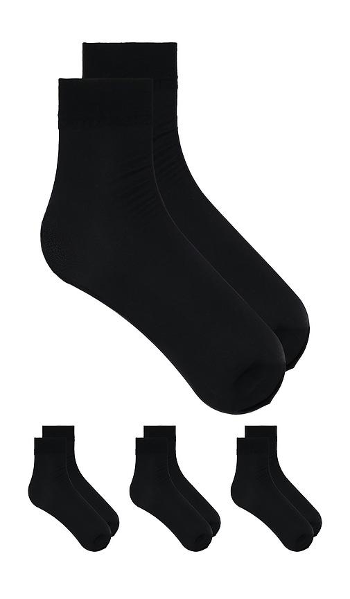 commando 3 pack high socks in black.