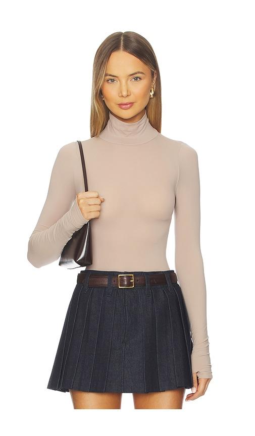 commando ballet turtleneck bodysuit with thumbholes in nude.