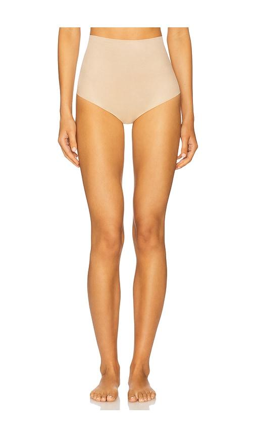 commando featherlight control thong in beige.