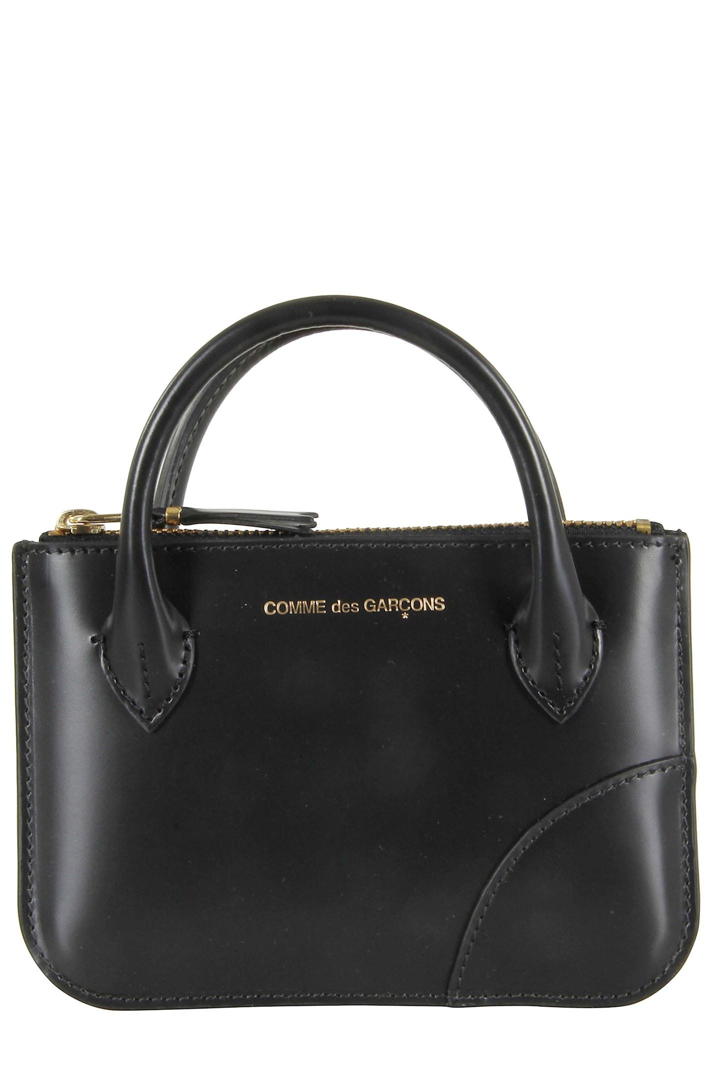 comme des garçons wallet handles