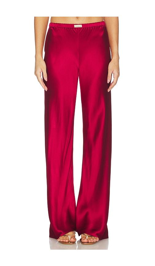 comme si the silk bias pant in red.