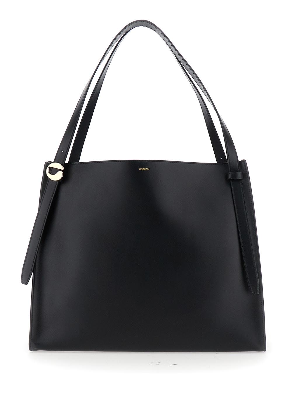 coperni black shoulder bag with logo detail and logo lettering on the front in leather woman