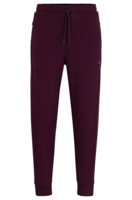 cotton-blend tracksuit bottoms with hd logo print- light pink men's jogging pants
