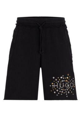 cotton-terry shorts with stud-effect artwork- black men's jogging pants