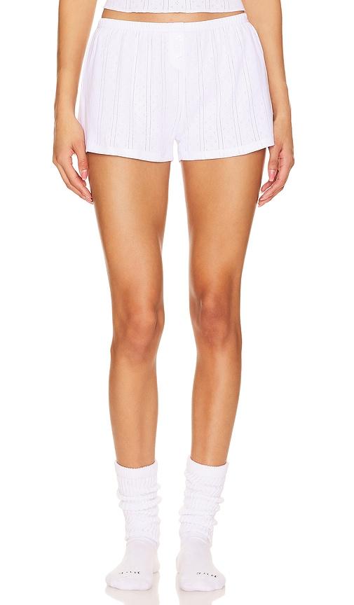 cou cou intimates the short in white.