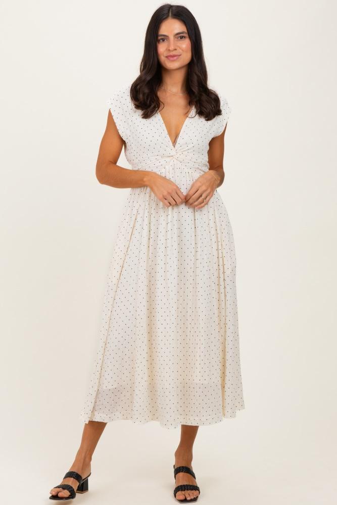 cream polka dot twisted detail v neck maxi dress