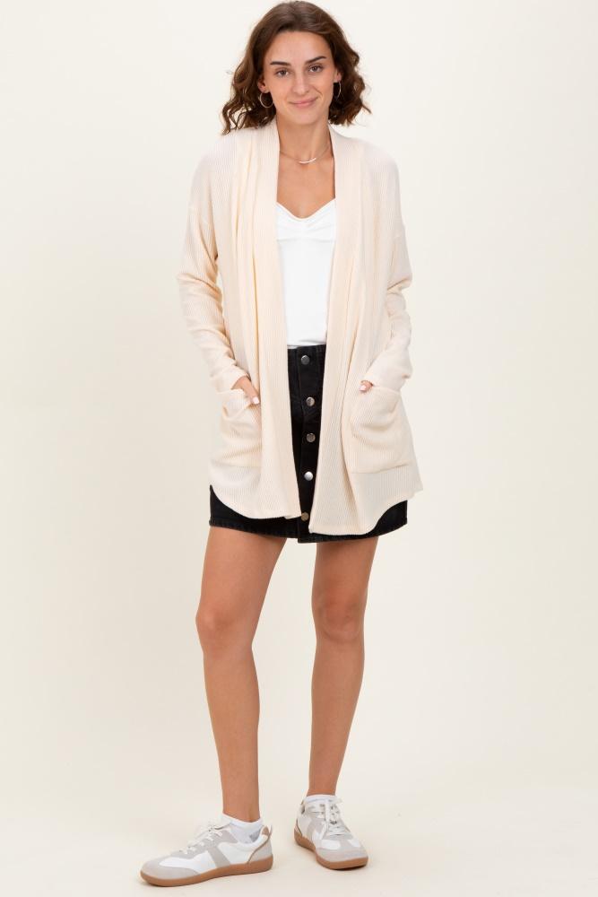 cream solid ribbed long sleeve open front pocket cardigan