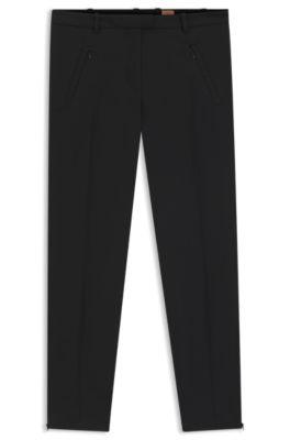 cropped slim-fit trousers with zipped hems- black women's pants