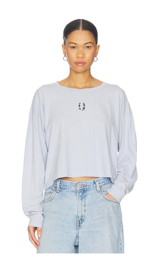 daydreamer cow pattern horseshoe meet & greet long sleeve top in baby blue.