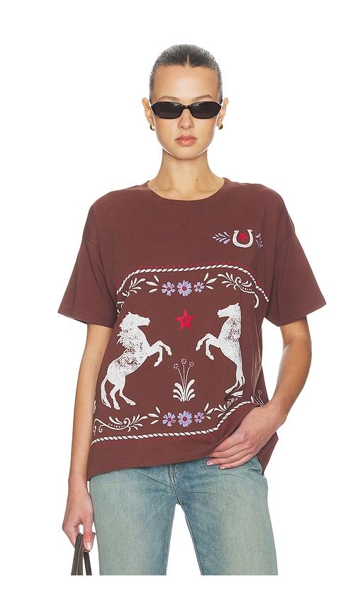 daydreamer floral horse patter merch tee in brown.