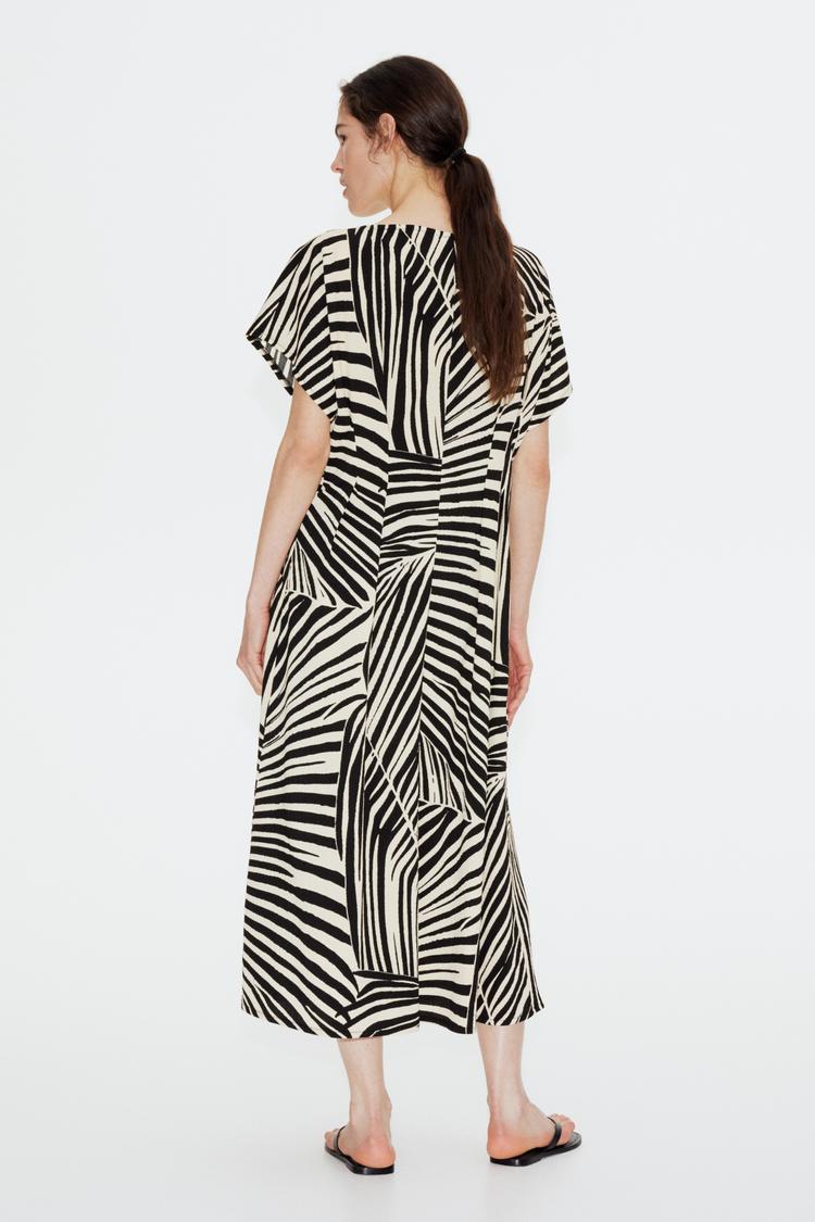 defined-waist maxi dress