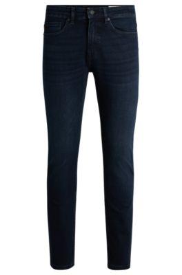 delaware slim-fit jeans in blue-black soft-motion denim- dark blue men's jeans