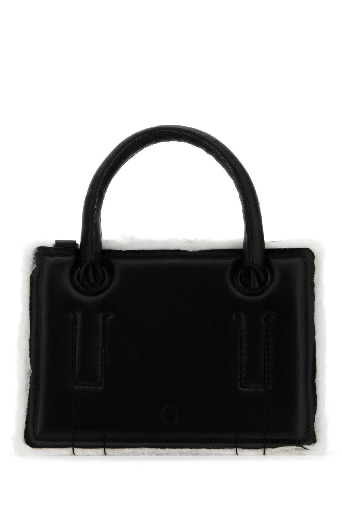 dentro black leather mini otto handbag