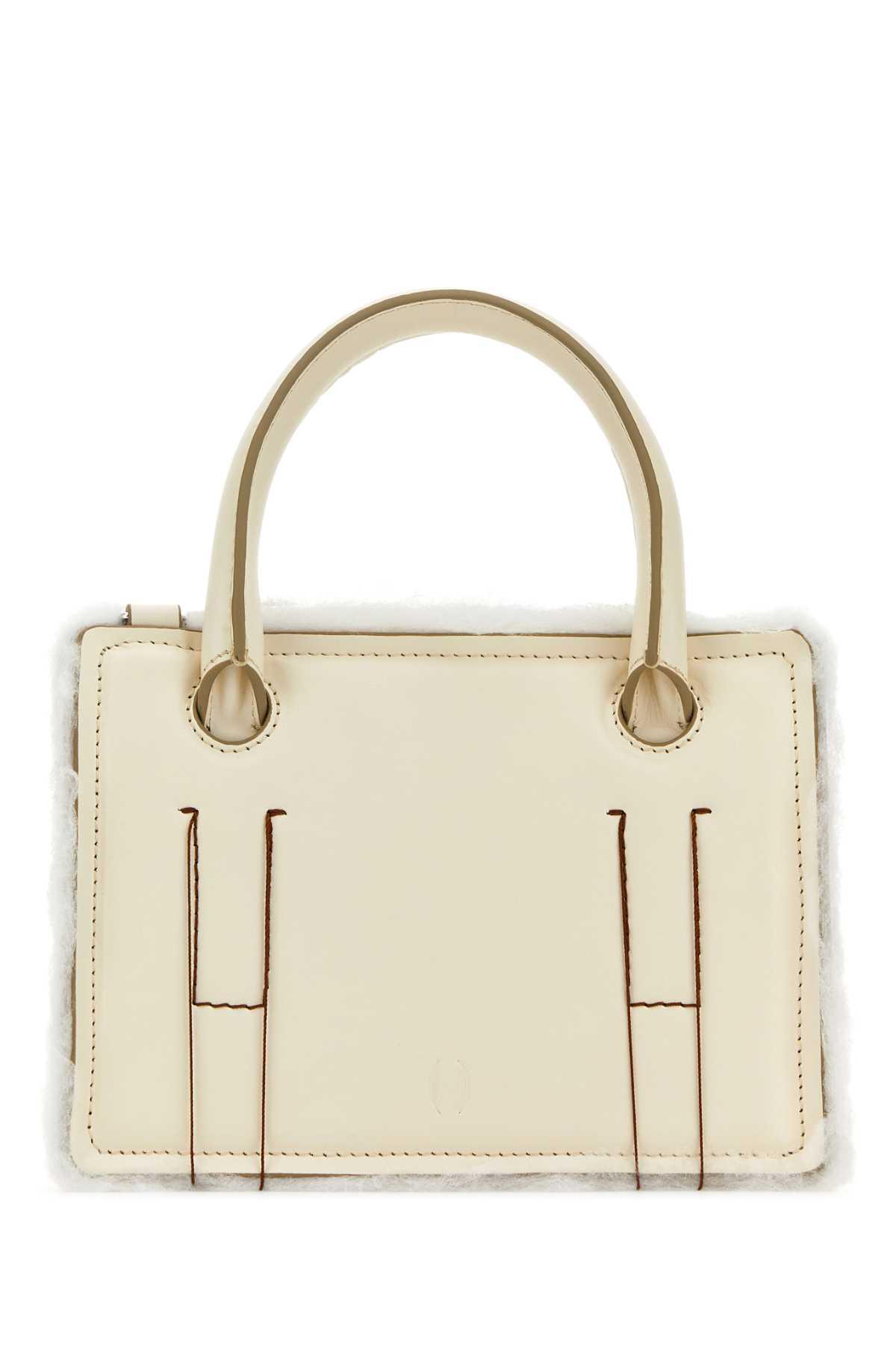 dentro ivory leather mini otto handbag