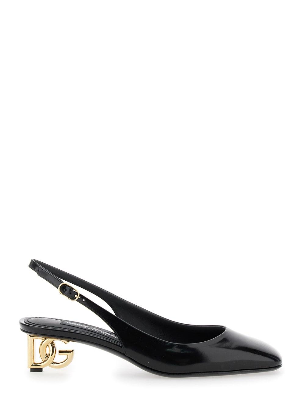dolce & gabbana black dècolletè with dg logo on the heel in shiny leather woman