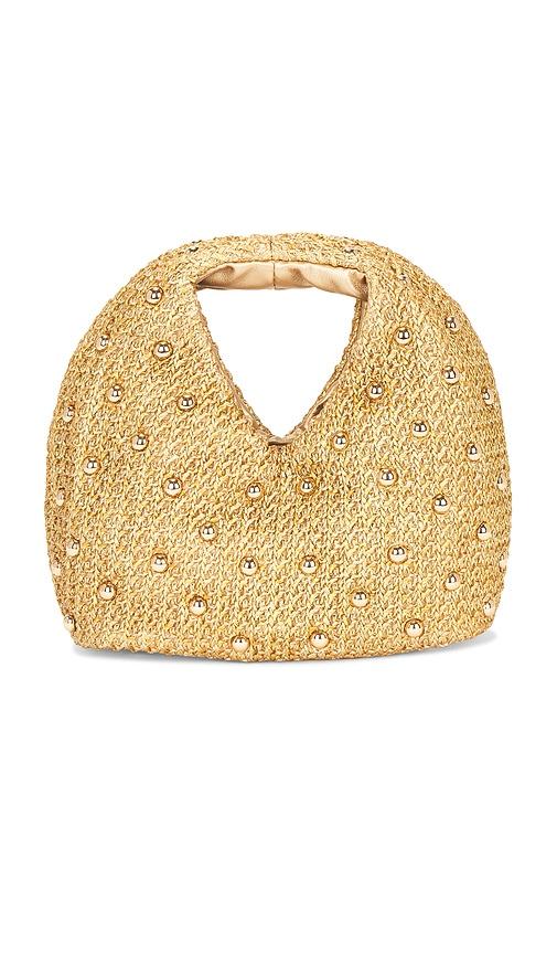 dolce vita studded raffia bag in tan.