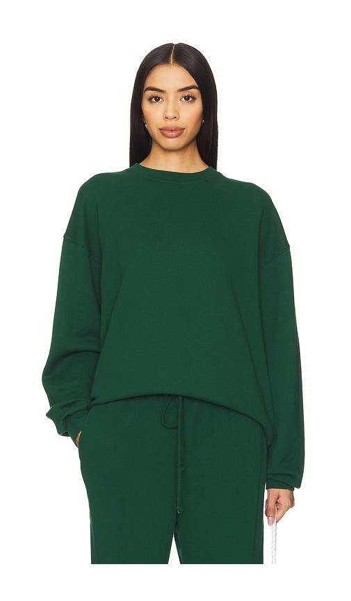 donni. x revolve eco fleece crewneck sweatshirt in green.