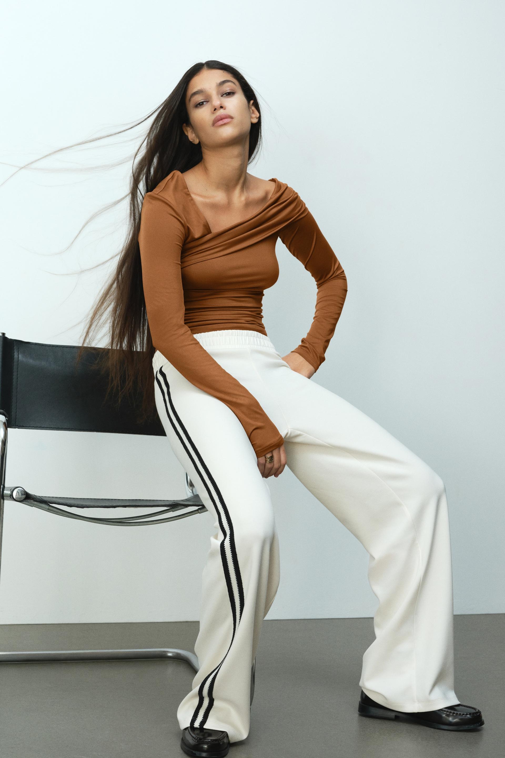 draped one-shoulder top