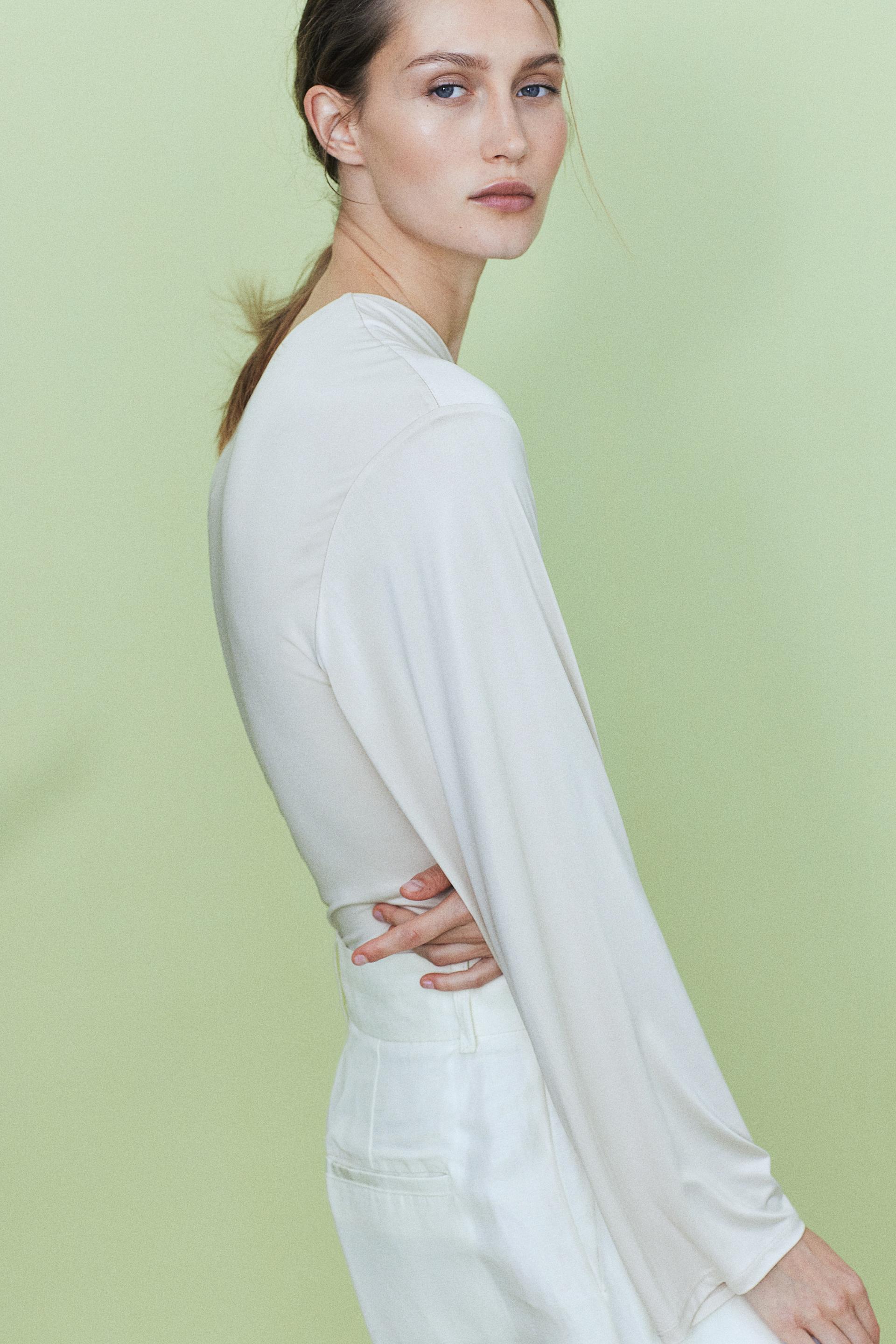 draped one-shoulder top